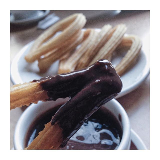 The only churros worth your calories, are the ones in Spain. The chocolate dip is thick and rich but not too sweet, it coats the churros evenly for a full crunchy bite. #imisschurros
.
.
.
#barcelona #churros #foodstagram #foodporn #chocolate #foodpics #foodshot #instafood #yummy #delicious #dailyfoodfeed #sgvsco #onthetable #foodvsco #food #foodporn #yum #igers #instafood #like #foodpics #foodies #latergram #igersworldwide #dip #spanish #spain #snacks - Salvo Tinnirello (@manwithaplant)