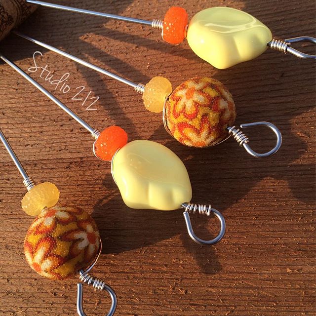 Handcrafted Food and Cocktail picks~
Food grade stainless steel pick, glass and multi-medium beads with wire. The shape of the yellow beads cradle your fingers and feels like a custom grip! Great for food or cocktail styling, entertaining and gift giving. 
See bio for link to my Etsy shop!
Set of 4 ~ $15.00
#foodphotography #cocktailphotography #foodstyling #cocktailstyling #props #foodprops #cocktailprops 
#drink #eat #prettyfood #prettydrinks
#entertaining #appetizers 
#cupcakes #cocktails 
#barware #bartender #martini #vodka #gin #cosmo #bloodymary #alcohol #drinkporn #sunshine #butter #feelssogood - Dżoana Raspberry (@art.studio212)